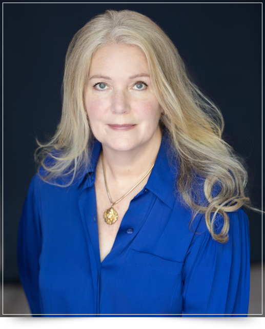 Sonya Sawin in a professional headshot wearing a blue blouse, with long blonde hair against a dark background.