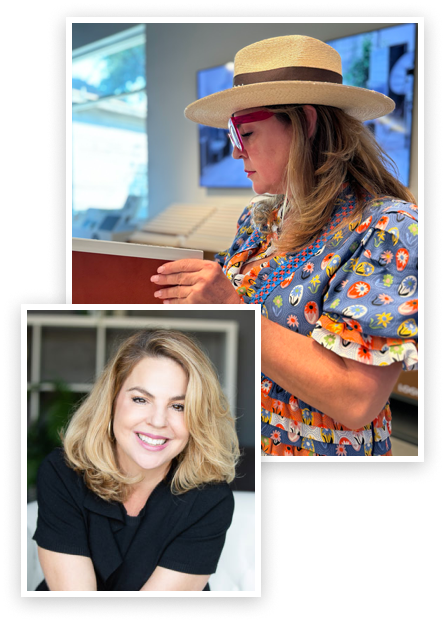 Heather Toolin examining design samples in Austin studio, wearing a patterned blouse and straw hat.